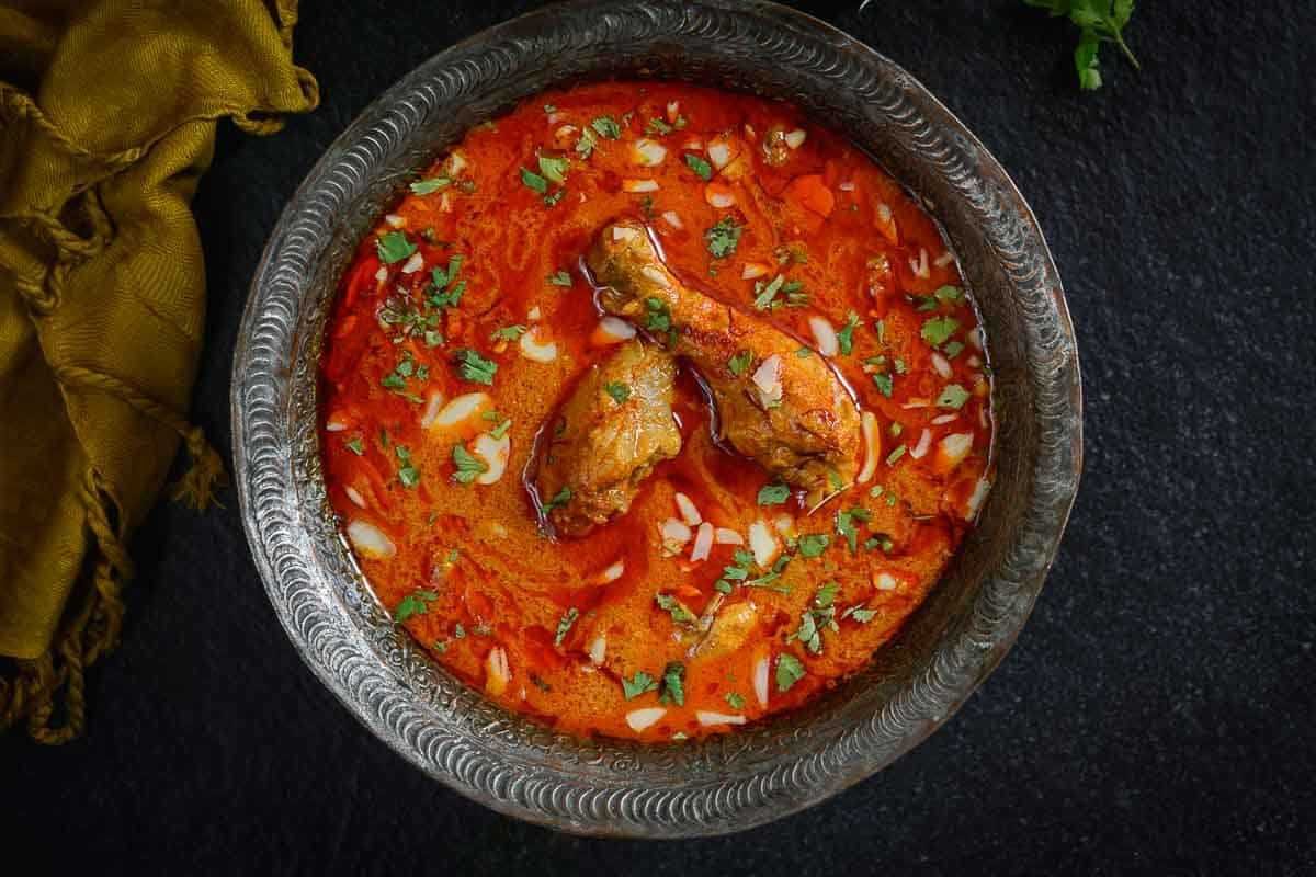 Jafrani Chicken Kormaদুপুরের ভূরিভোজ হোক বা নৈশভোজ, এই শীতে বানিয়ে ফেলুন জাফরানি চিকেন কোর্মা